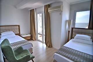 Отель Hotel Adrović Свети-Стефан Семейный люкс с 2 спальнями-10