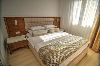 Отель Hotel Adrović Свети-Стефан Семейный люкс с 2 спальнями-1